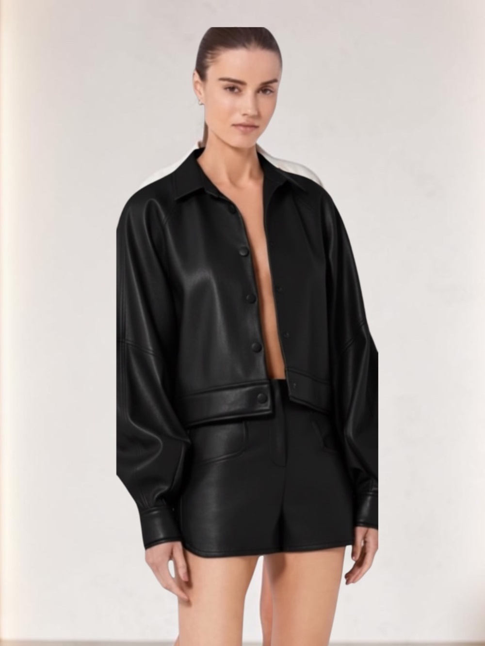 Alexis Faux Leather Buttoned Cuff Ceci
Jacket in black